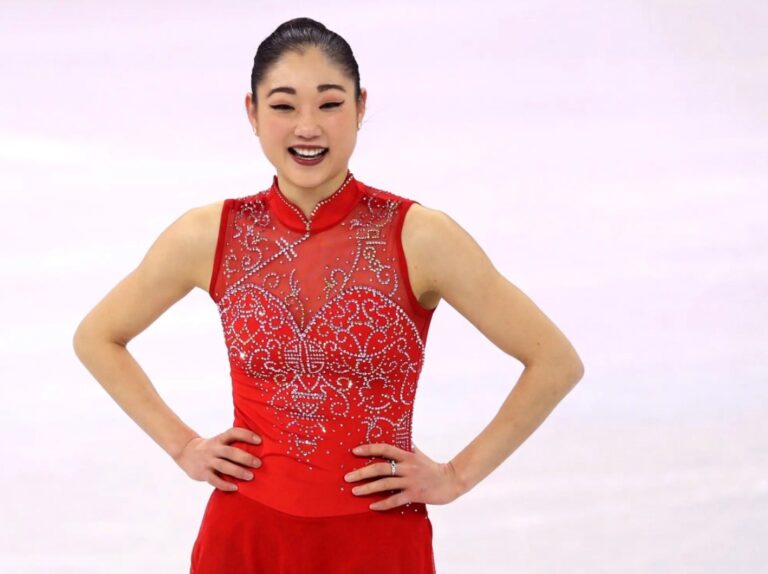 Mirari Nagasu smiling on ice skating rink