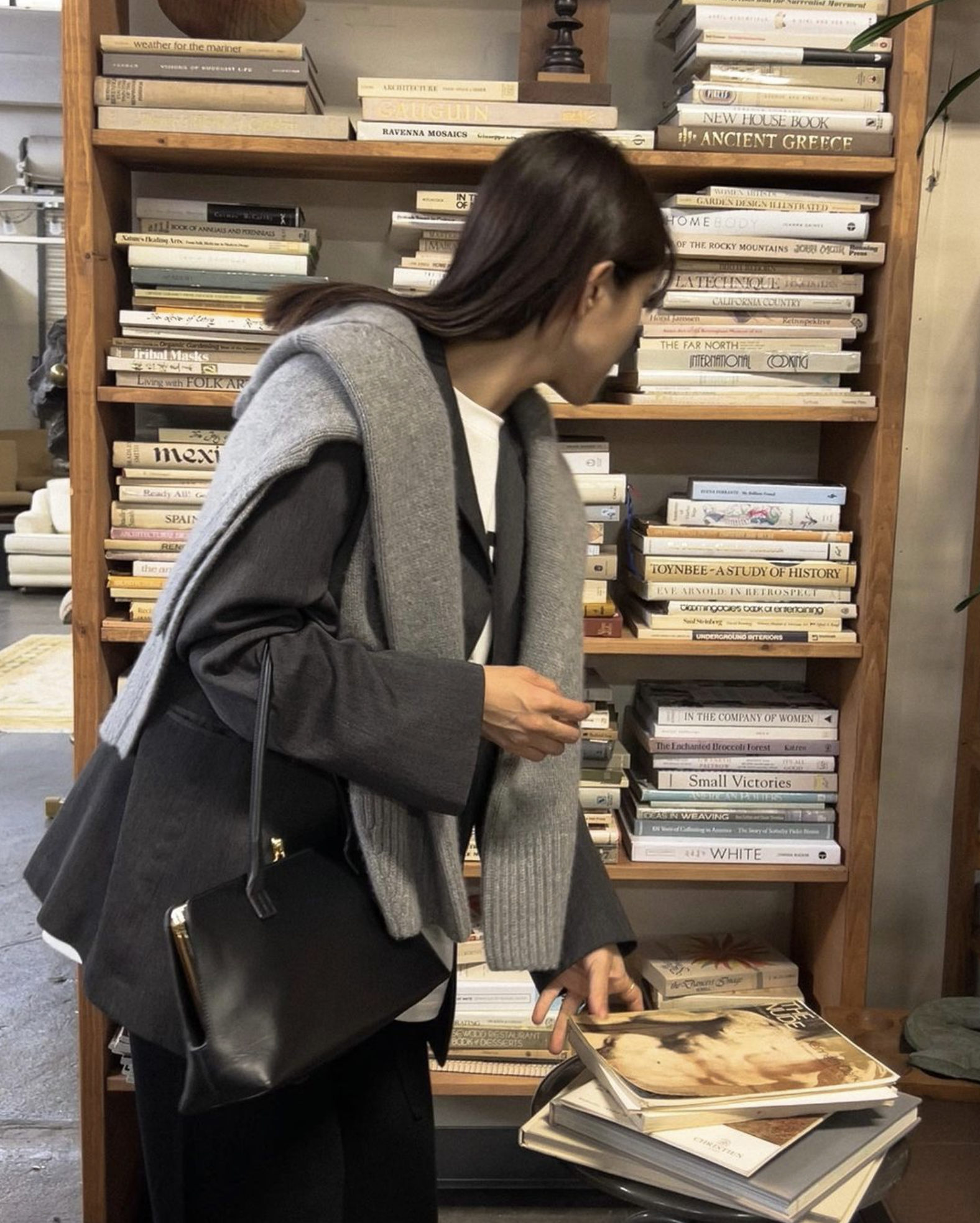 young woman in book store