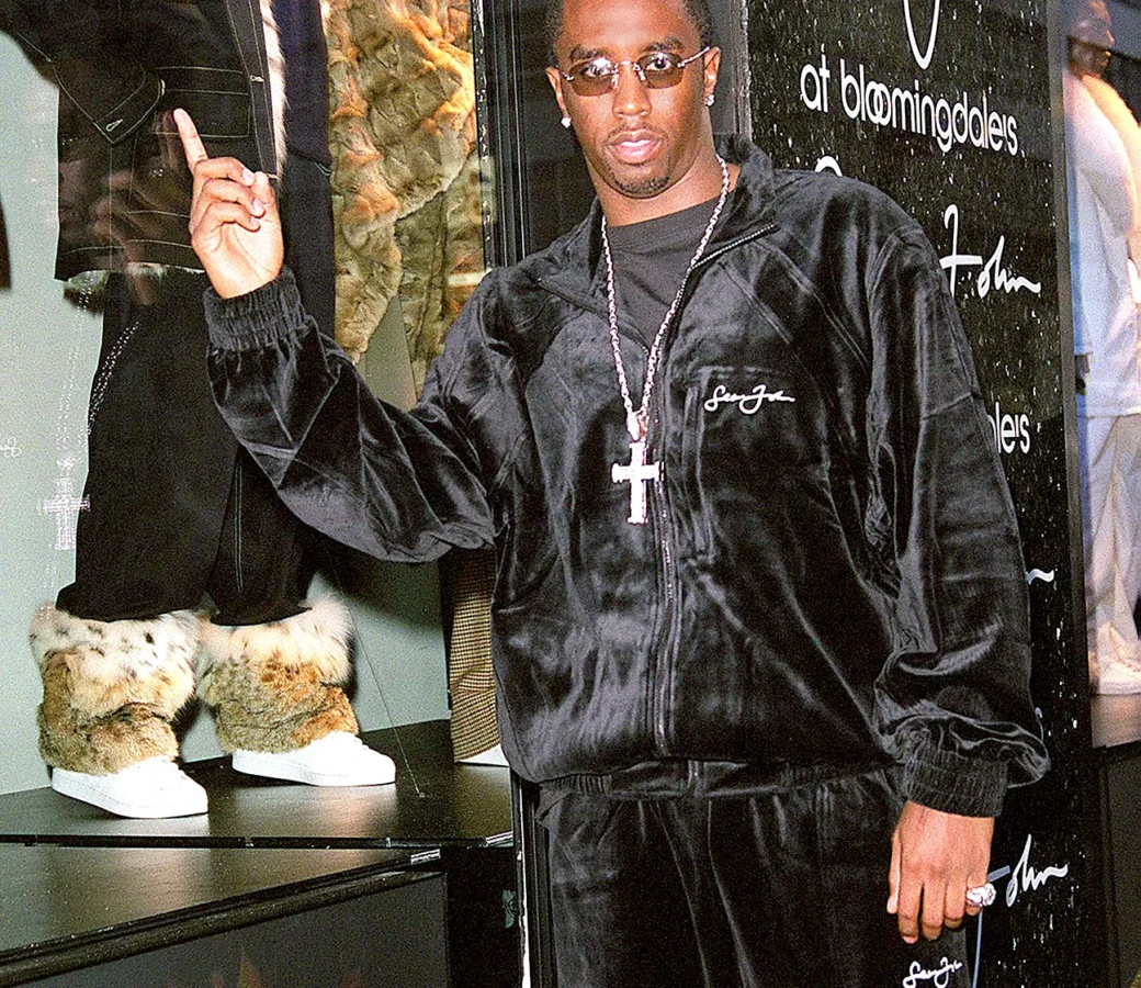 Diddy posing in front of a Bloomingdales storefront for Sean John